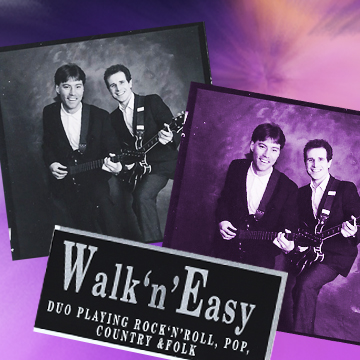 publicity photo in black and white showing John Cartwright and working duo partner, Justin Creasey, dressed in Everly Brothers attire, posing with guitars